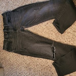 midrise black distressed skinny jeans